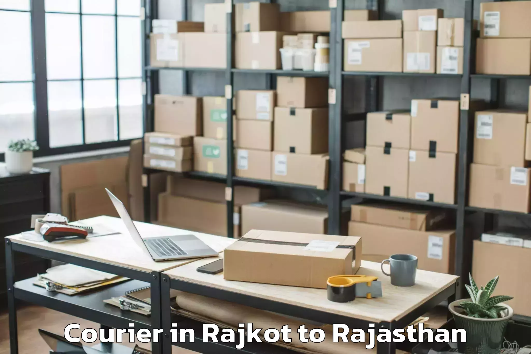 Easy Rajkot to Udpura Courier Booking